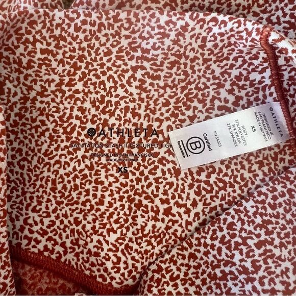 Athleta Rust Cheetah Print Salutation Stash Textured 7/8 Pocket Leggings - Picture 11 of 11
